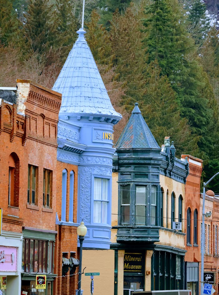 Quaint historic buildings on a colorful street in Wallace, Idaho's scenic downtown.